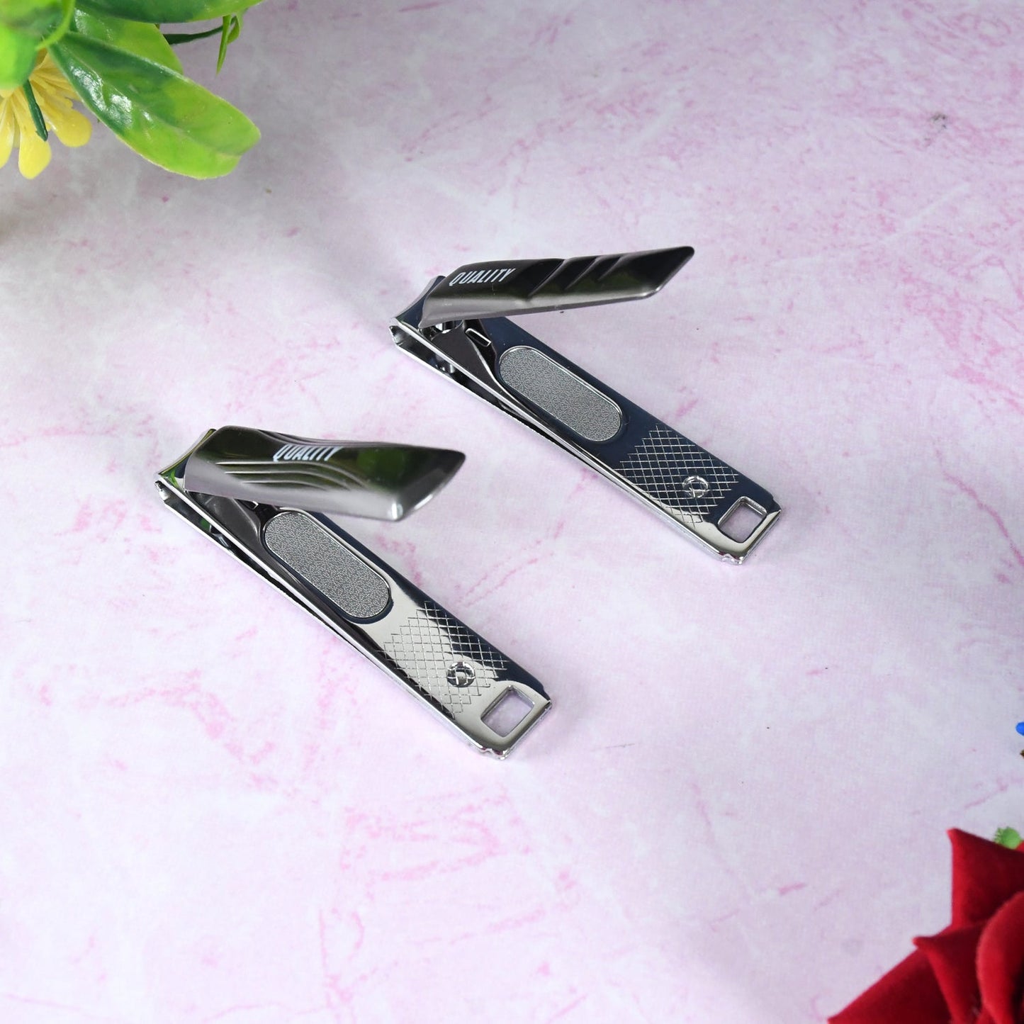 Stainless steel folding nail clipper with nail file