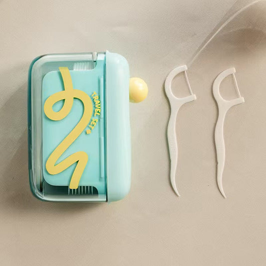 Floss dispenser with push button