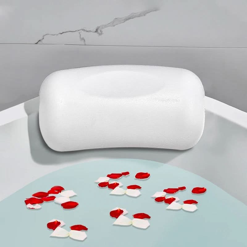 Ergonomic bathtub pillow with anti-slip coating