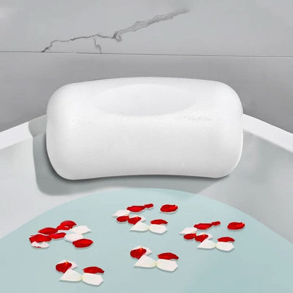 Ergonomic bathtub pillow with anti-slip coating