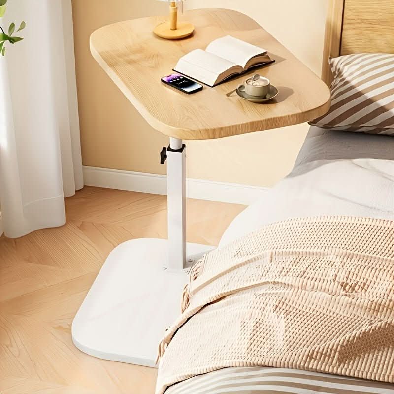 Height-adjustable side table with wooden top and metal frame