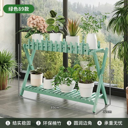2-tier bamboo plant shelf with decorative fence panel