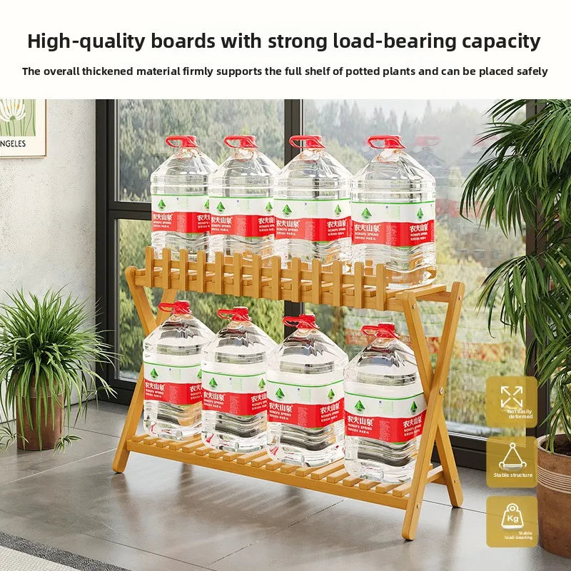 2-tier bamboo plant shelf with decorative fence panel