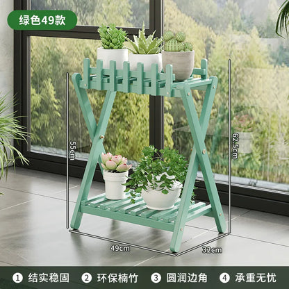 2-tier bamboo plant shelf with decorative fence panel