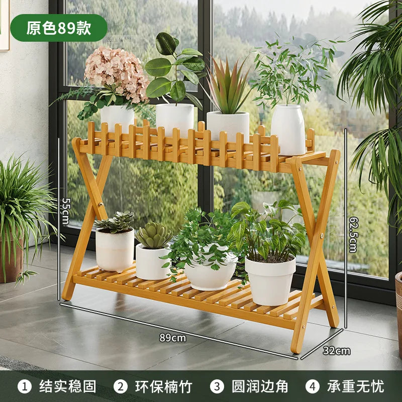 2-tier bamboo plant shelf with decorative fence panel