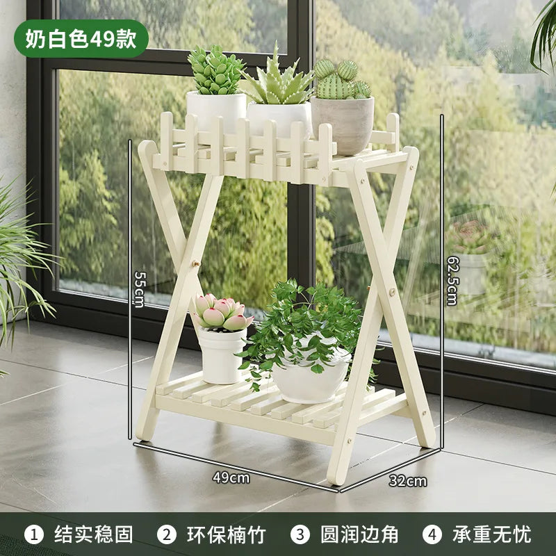 2-tier bamboo plant shelf with decorative fence panel