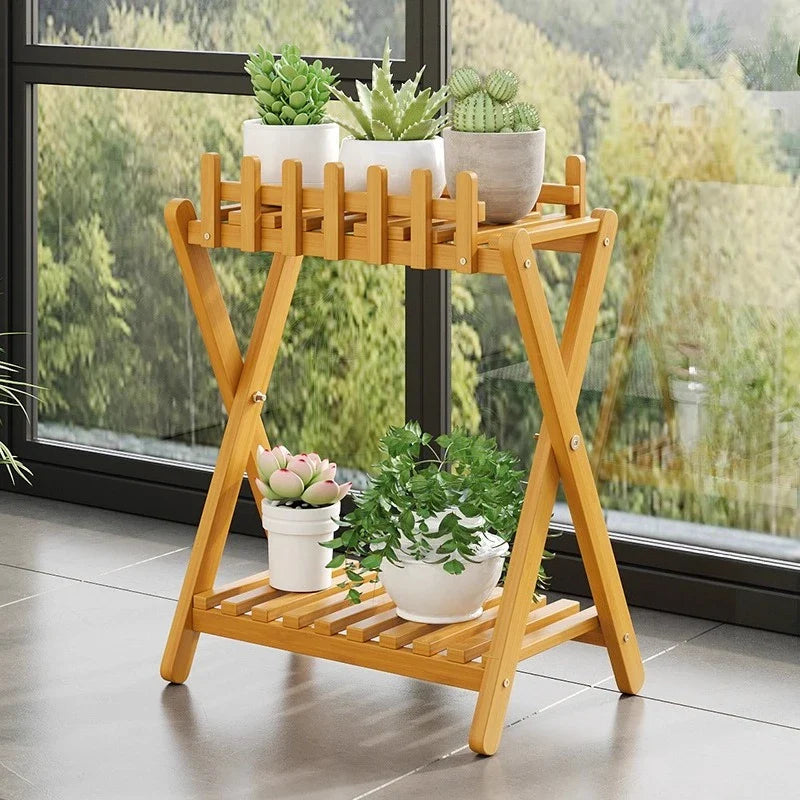 2-tier bamboo plant shelf with decorative fence panel