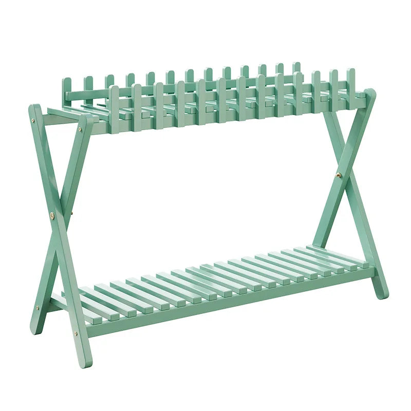 2-tier bamboo plant shelf with decorative fence panel