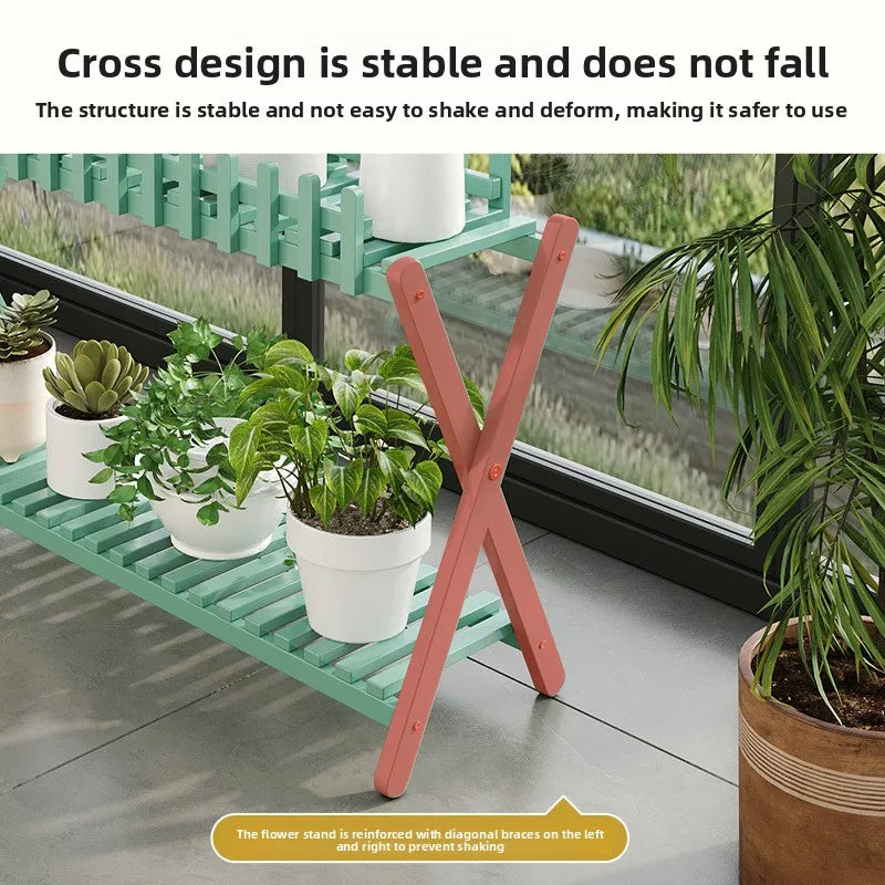 2-tier bamboo plant shelf with decorative fence panel