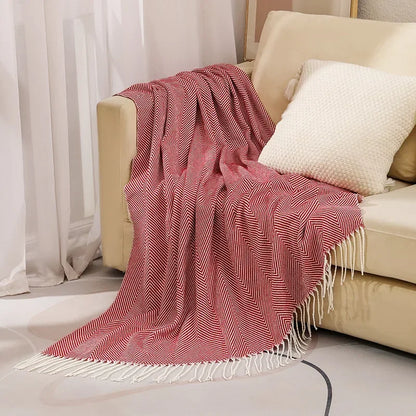 Cotton sofa throw with striped pattern and fringes