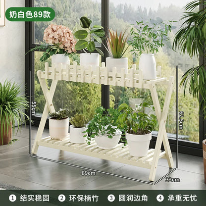 2-tier bamboo plant shelf with decorative fence panel