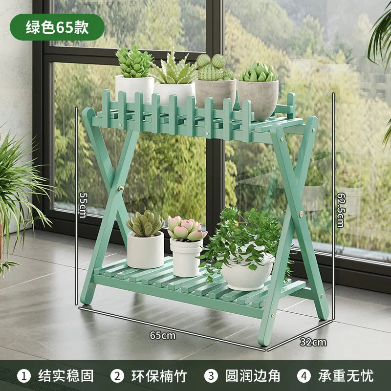 2-tier bamboo plant shelf with decorative fence panel