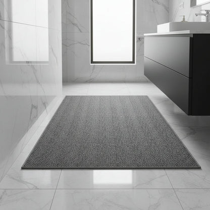 Absorbent doormat with geometric pattern