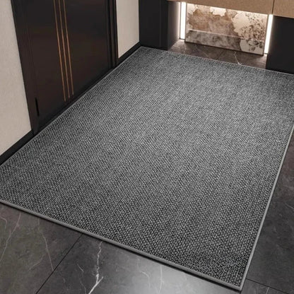 Absorbent doormat with geometric pattern